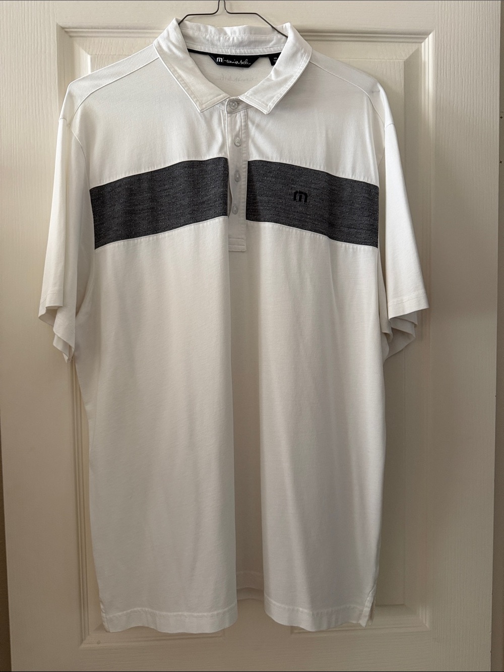 TravisMathew White Polo with Charcoal Chest Stripe